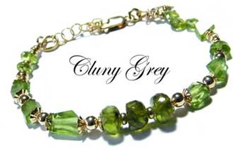 Peridot bracelet with yellow gold beads.