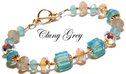 handmade Swarovski crystal bracelet with Pacific blue opal, beige opal and cubes.