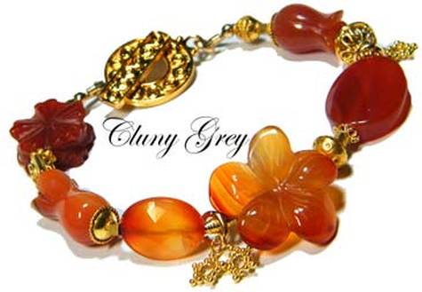 Carnelian carved flower bracelet with gold.