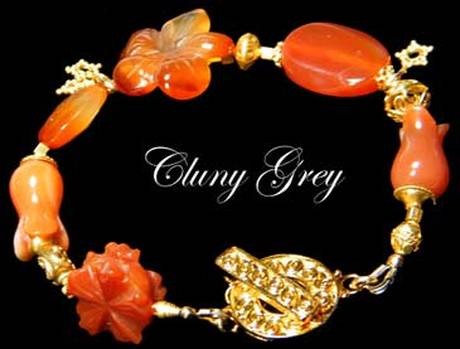 Carnelian carved flower bracelet with gold.