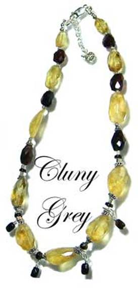 Citrine necklace with dark garnets.