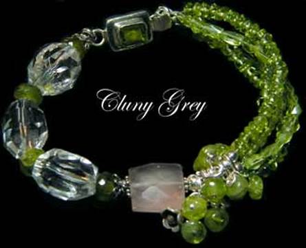 Peridot bracelet with quartz crystal gemstones and sterling silver. 